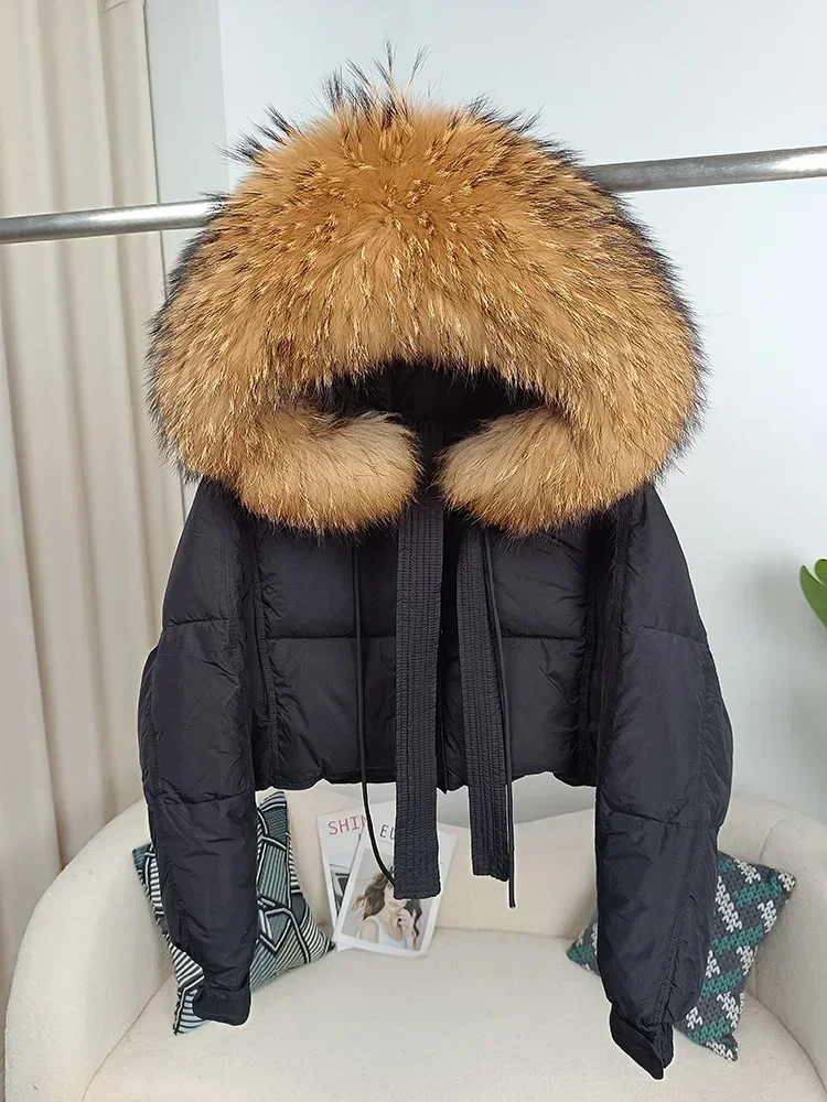 Shiny black coat with big fur hood on sale